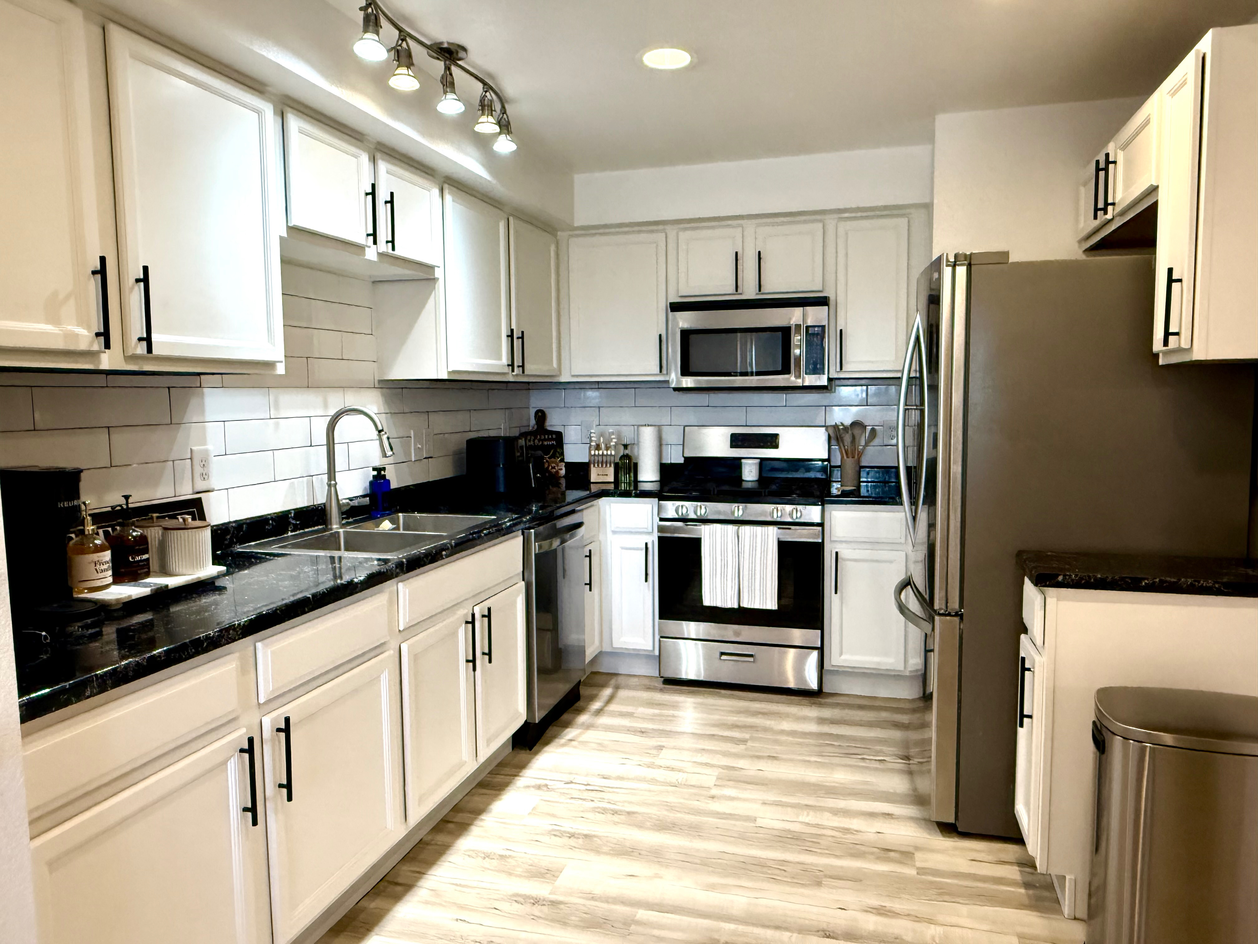 Townhome | Garage & Private Backyard - Photo 7