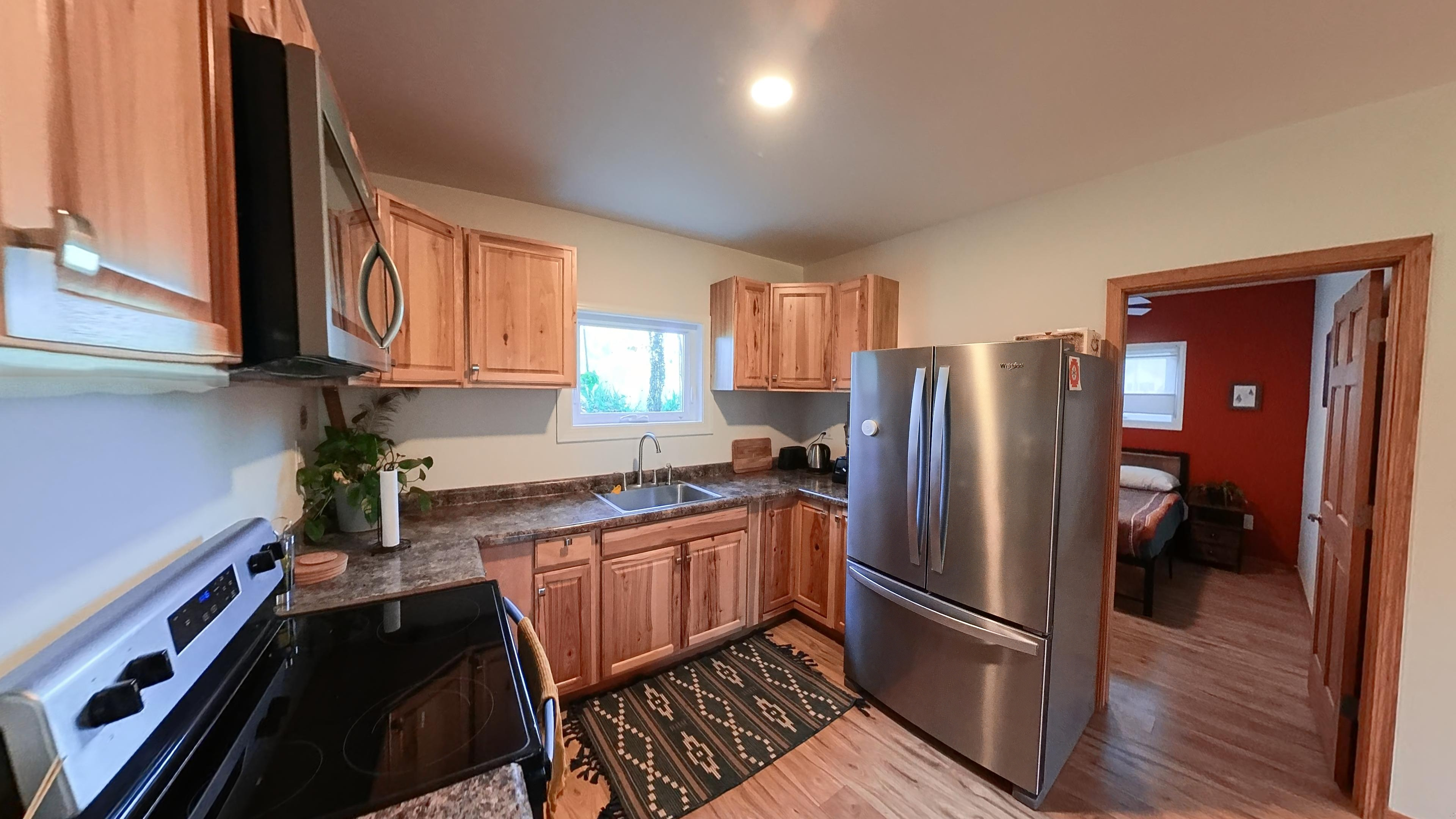 Charming Furnished Apartment | Peaceful Setting & Convenient Amenities - Photo 11