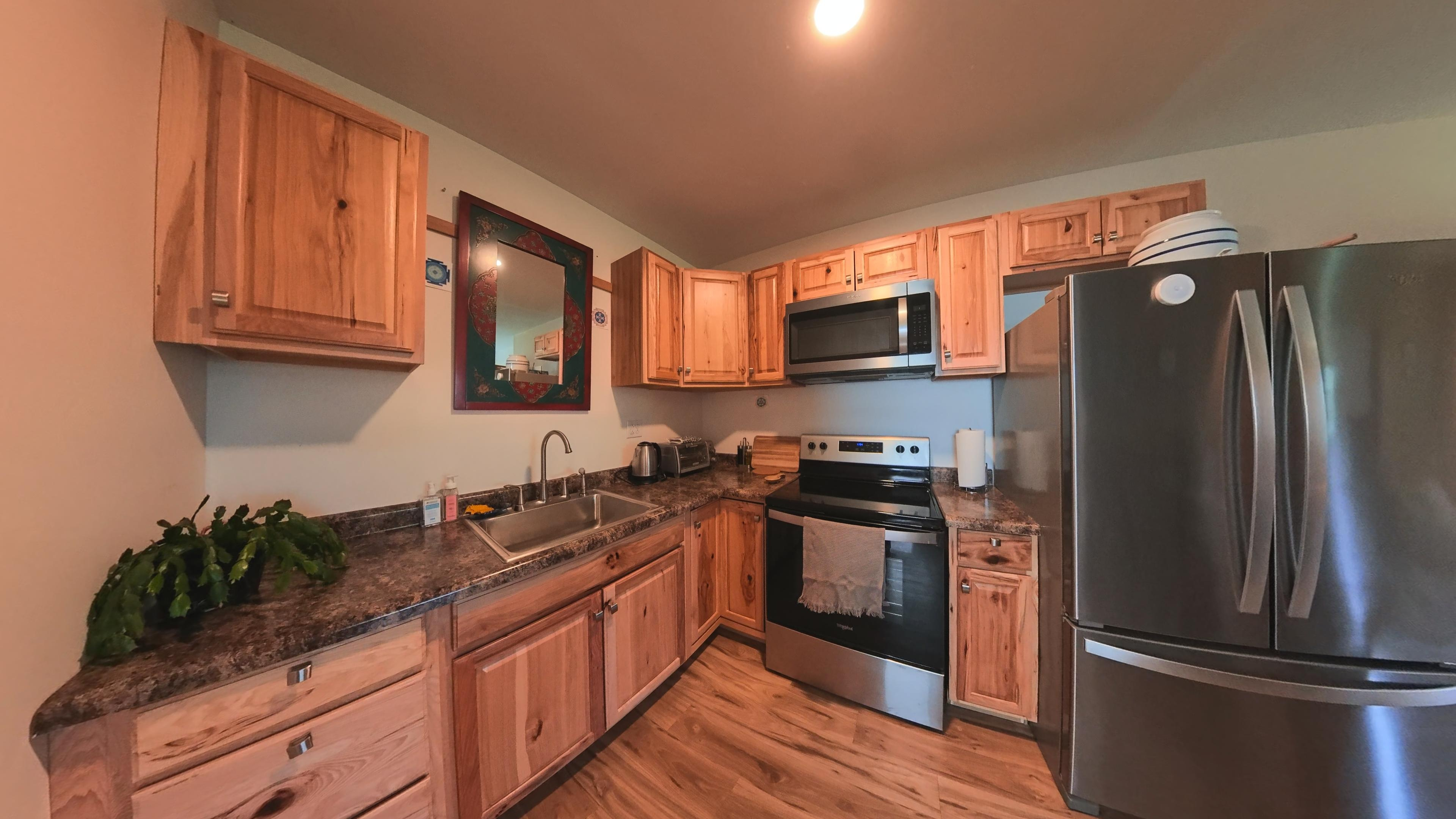 Charming Furnished Apartment | Peaceful Setting & Convenient Amenities - Photo 3