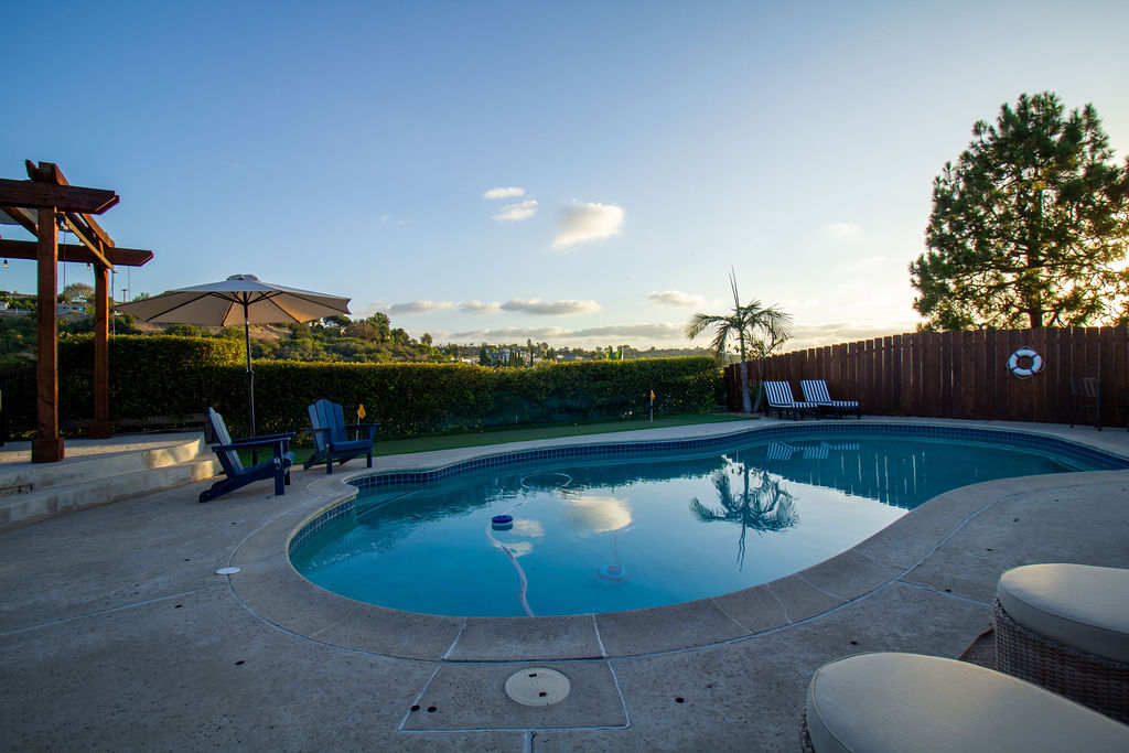 Spacious 4BR Home in Central San Diego | Pool, Hot Tub & Canyon Views - Photo 2
