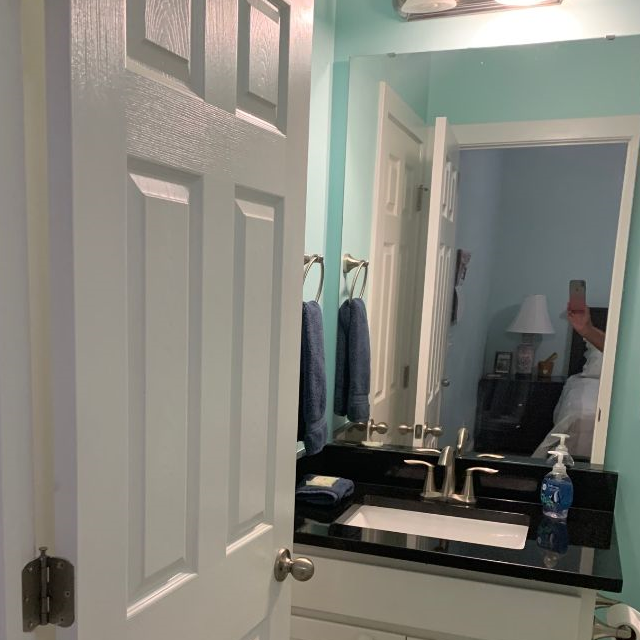 Downstairs bedroom suite with private bathroom! - Photo 7