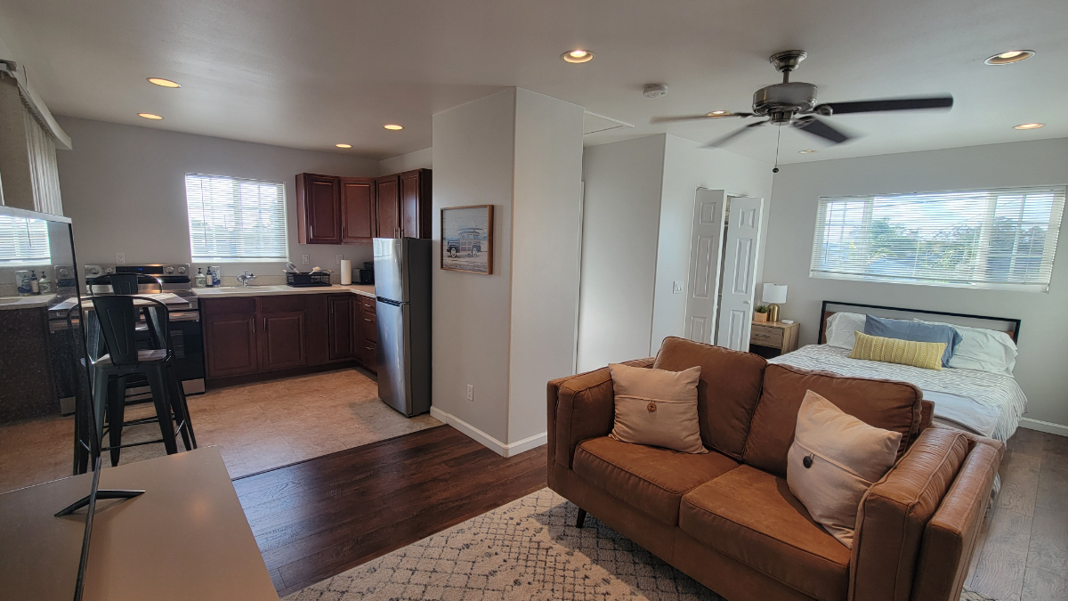 Large Furnished Studio with full kitchen, private balcony in perfectly located Birdland - Photo 1