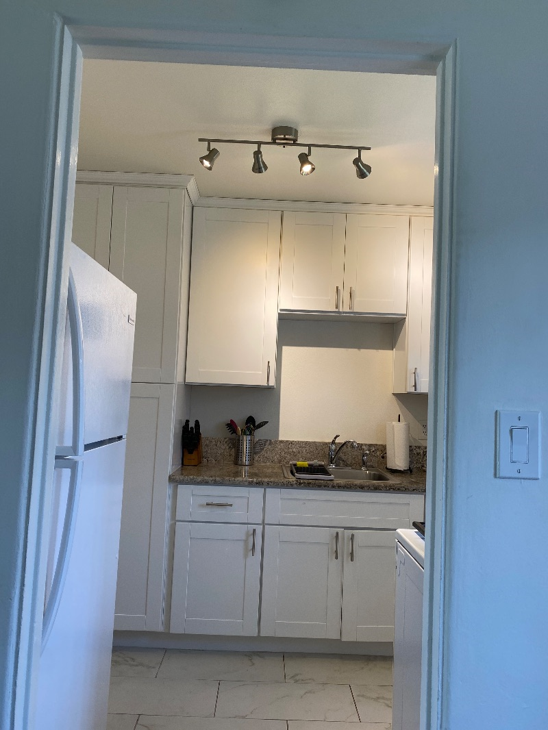 TWO BLOCKS FROM THE BEACH - FULLY FURNISHED - UPDATED 1/1 & GARAGE - Photo 5