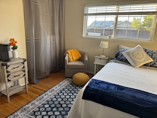 Safe, Cozy and Centrally Located Home Bedroom 1 - Photo 3