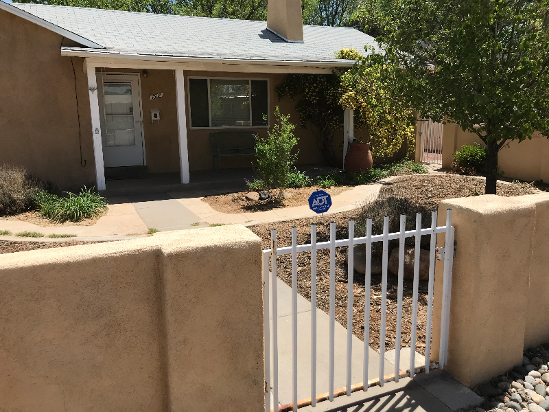 Warm and bright, freshly updated vintage 1950's midtown Albuquerque home close to hospitals, university, shopping, and parks.
