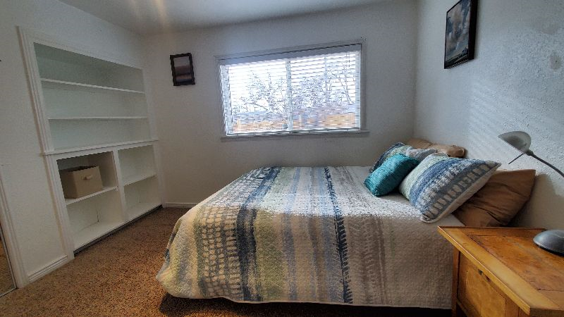 Bright bedroom with private bath