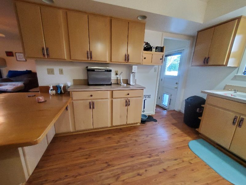Available October 2026-- Pet Friendly 3 bedroom home with fenced yard - Photo 7