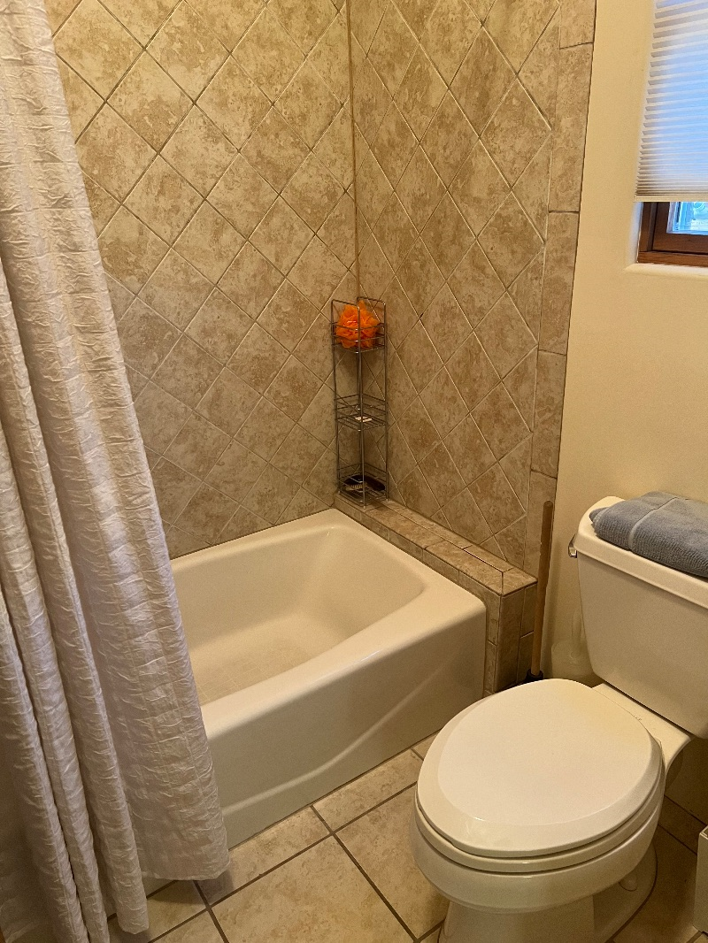 A lovely queen bedroom and private bath on the second floor of a beautiful 2-story single owner home - Photo 9