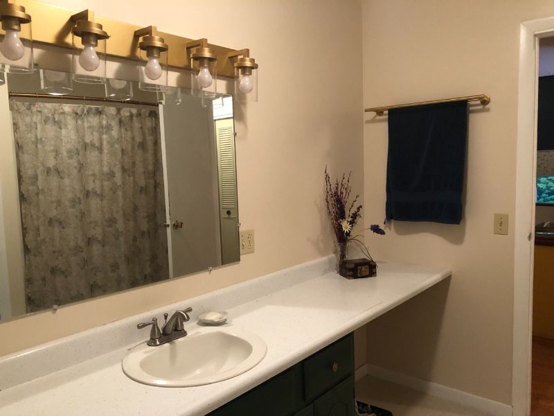 Two-bedroom main level apartment in raised ranch house; safe community only 2.7 miles from UVMMC - Photo 12