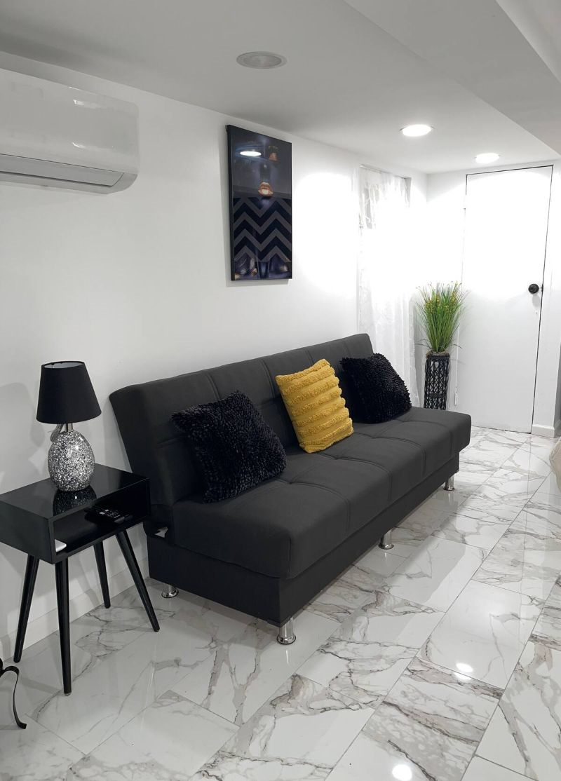 Experience Trendy Comfort and Style at Our Beautifully Renovated Studio Apartment in Vibrant Jamaica - Photo 7