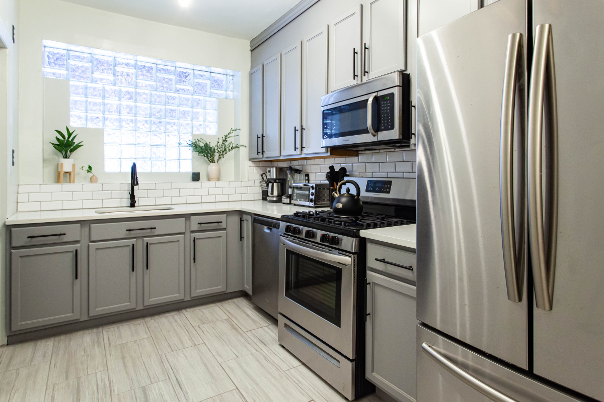 Sunny, Spacious 4-Bedroom, 2-Bath Home with Chic Decor - Photo 9