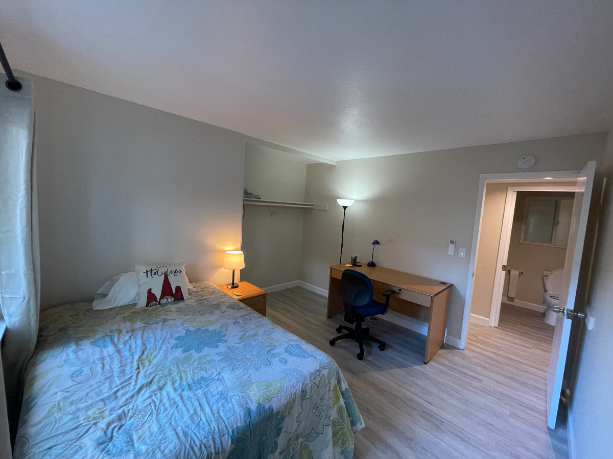 Bedroom with shared bath in fully renovated home