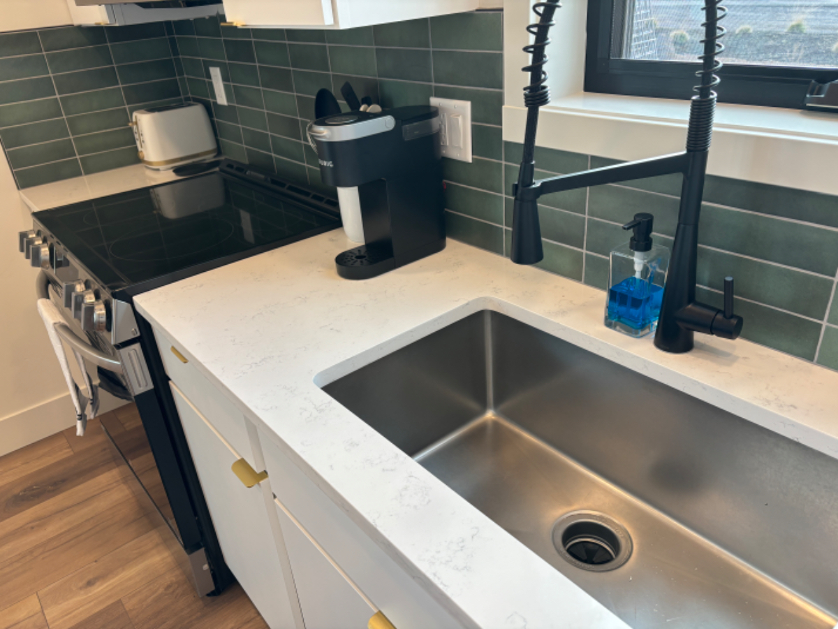 Welcome to your cozy, brand-new studio apartment with a delightful patio and breathtaking mountain view - Photo 6