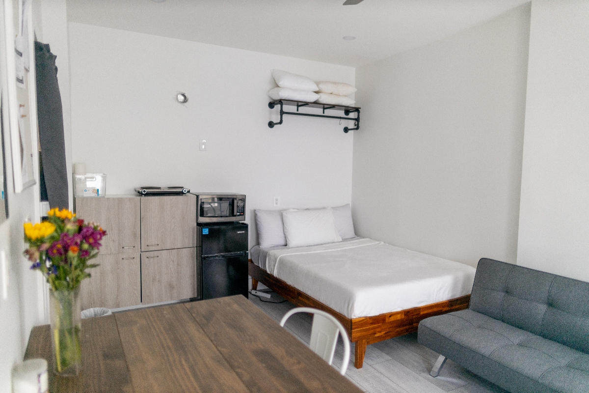 Discover a captivating historic building in Brooklyn, just steps from the iconic Manhattan Bridge with easy access to Manhattan's vibrant East Side and the United Nations, where charm meets convenience