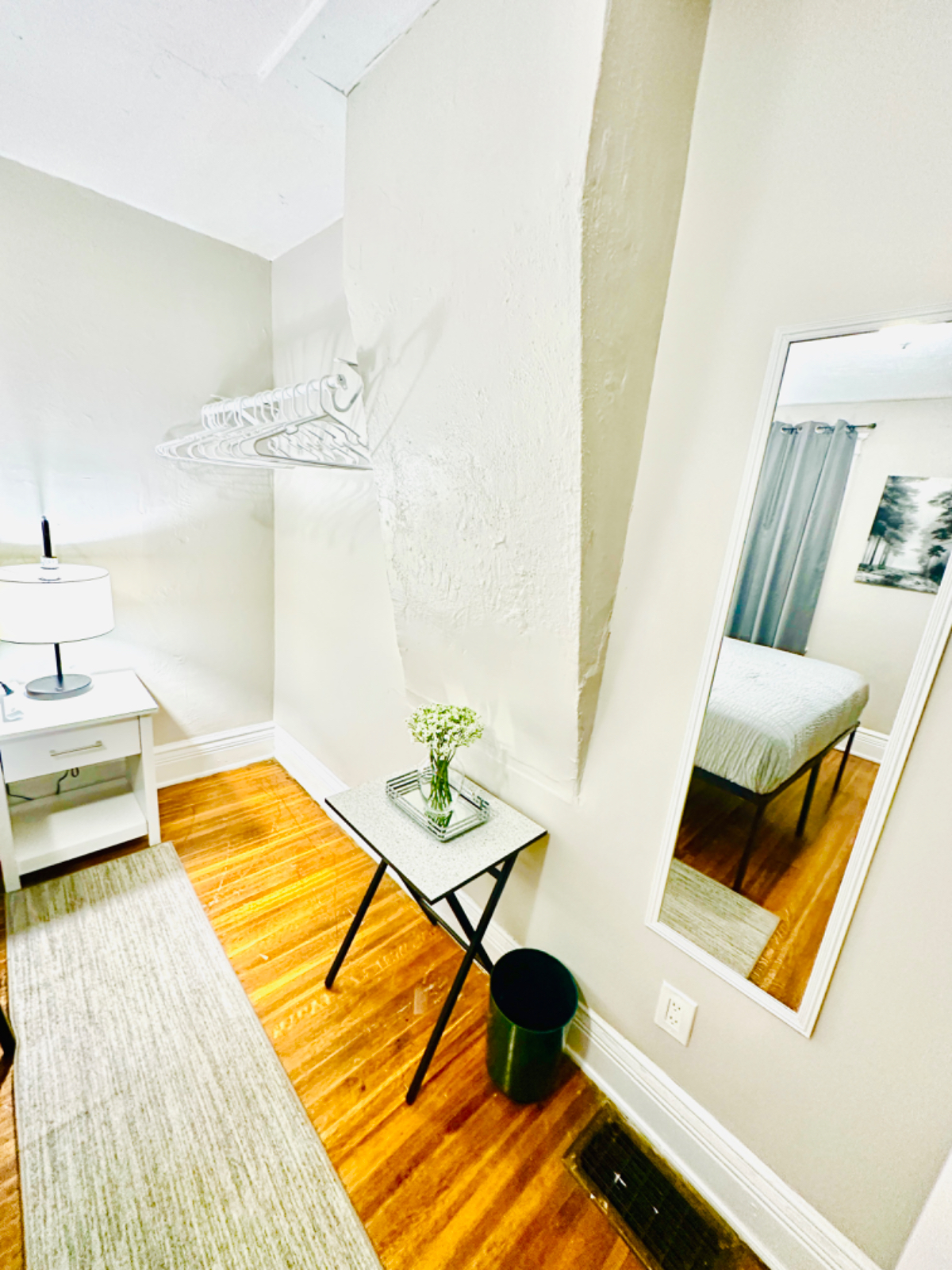 Rochester room with couch, microwave, and fridge - Photo 4