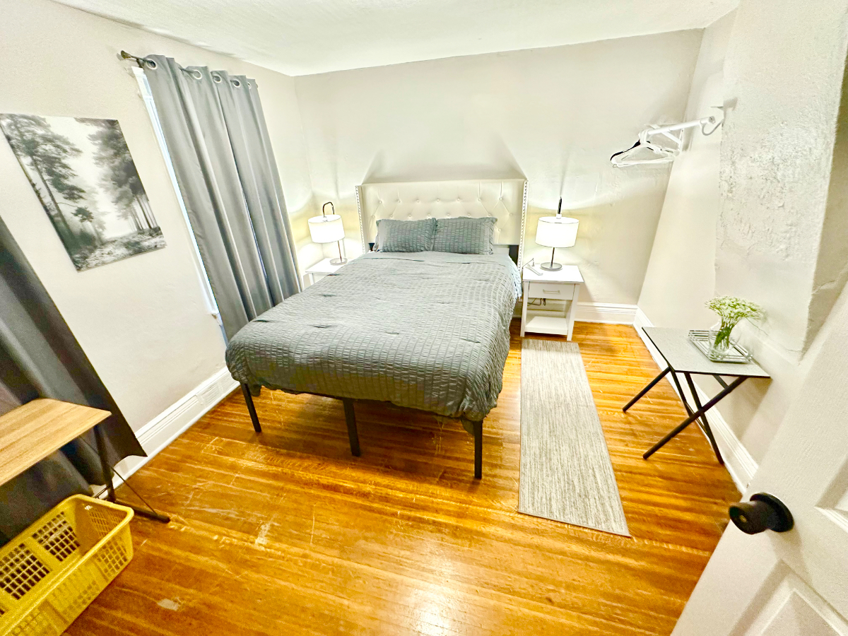 Rochester room with couch, microwave, and fridge - Photo 6
