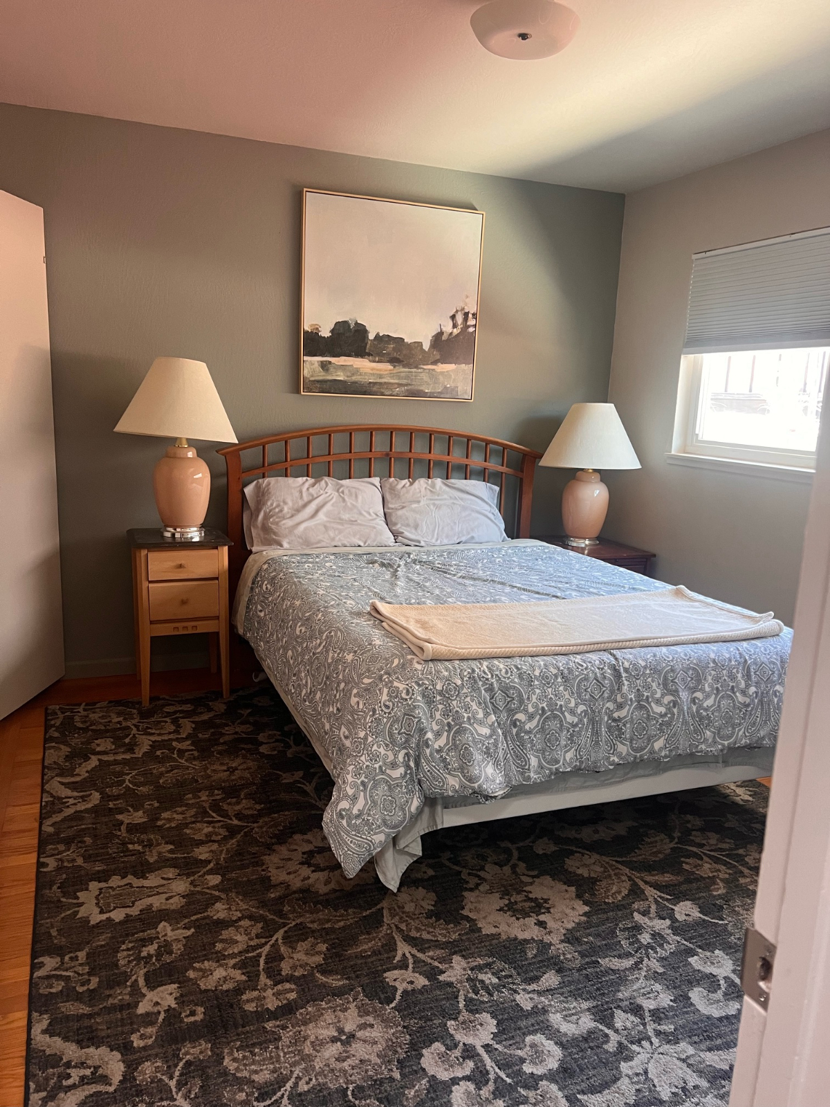 Inviting Queen Size Bedroom with Shared Bathroom