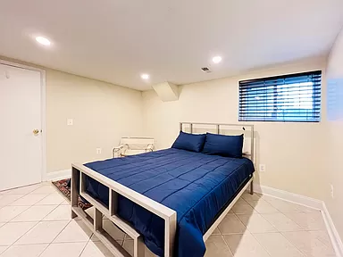Cozy Basement Level Retreat Comfortable 2-Bedroom Apartment with Deck, Modern Kitchen & Access to Re - Photo 12