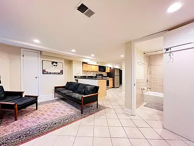 Cozy Basement Level Retreat Comfortable 2-Bedroom Apartment with Deck, Modern Kitchen & Access to Re - Photo 6