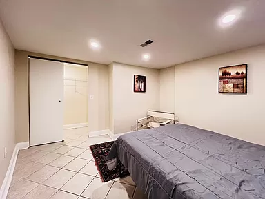 Cozy Basement Level Retreat Comfortable 2-Bedroom Apartment with Deck, Modern Kitchen & Access to Re - Photo 11