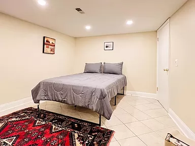 Cozy Basement Level Retreat Comfortable 2-Bedroom Apartment with Deck, Modern Kitchen & Access to Re - Photo 10