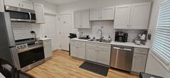 Furnished Upper Unit Apartment - Photo 2