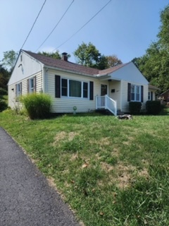 Inviting Cottage-Style Home in Peaceful Keyser Neighborhood - Photo 1