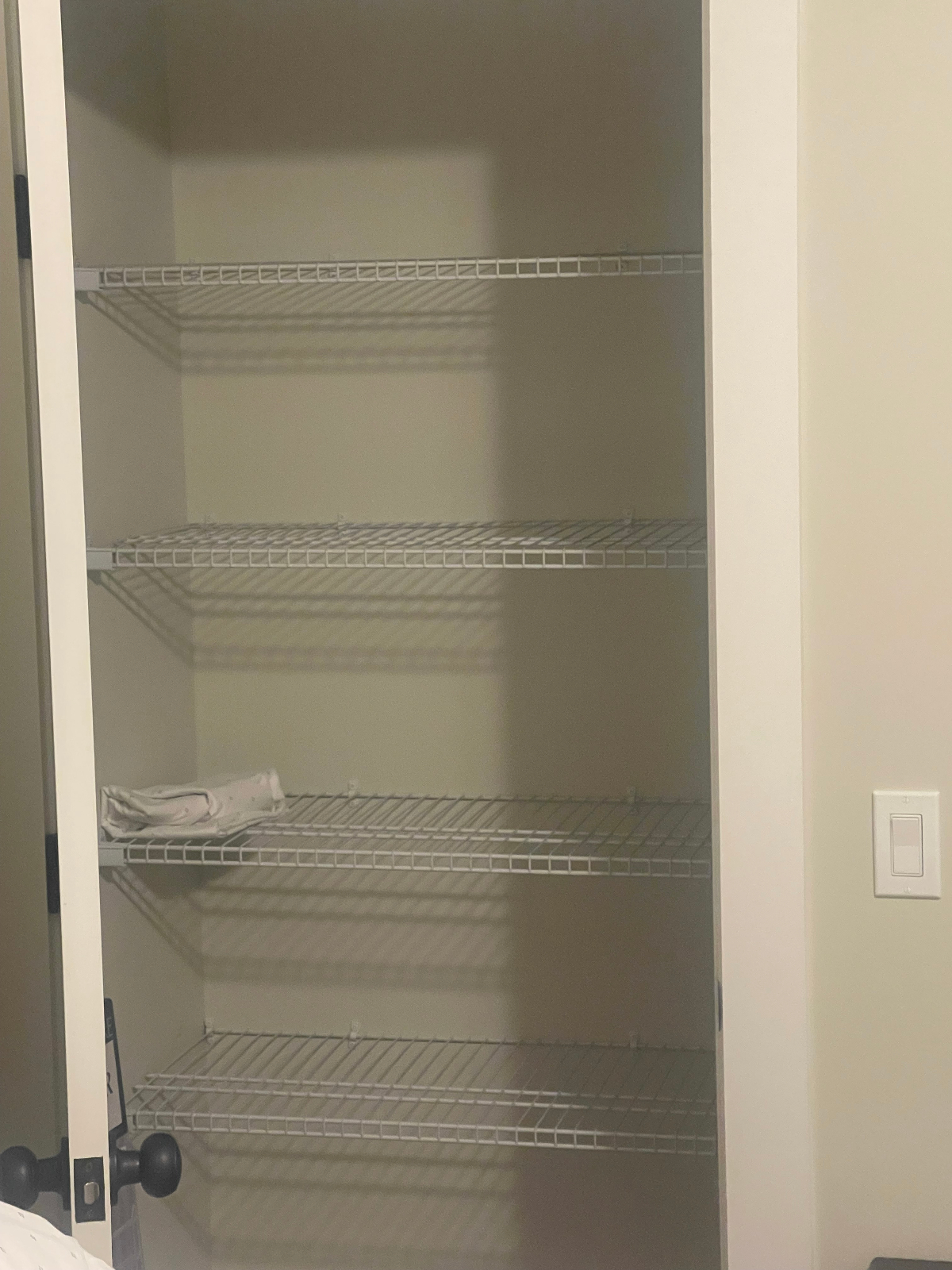 A beautiful master bedroom with a 75'' smart TV, a dresser, king size bed, air-conditioning in a new - Photo 5