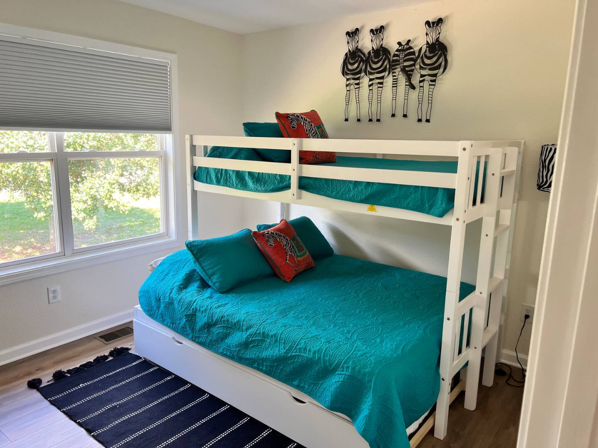 Triple bunk bed private bedroom