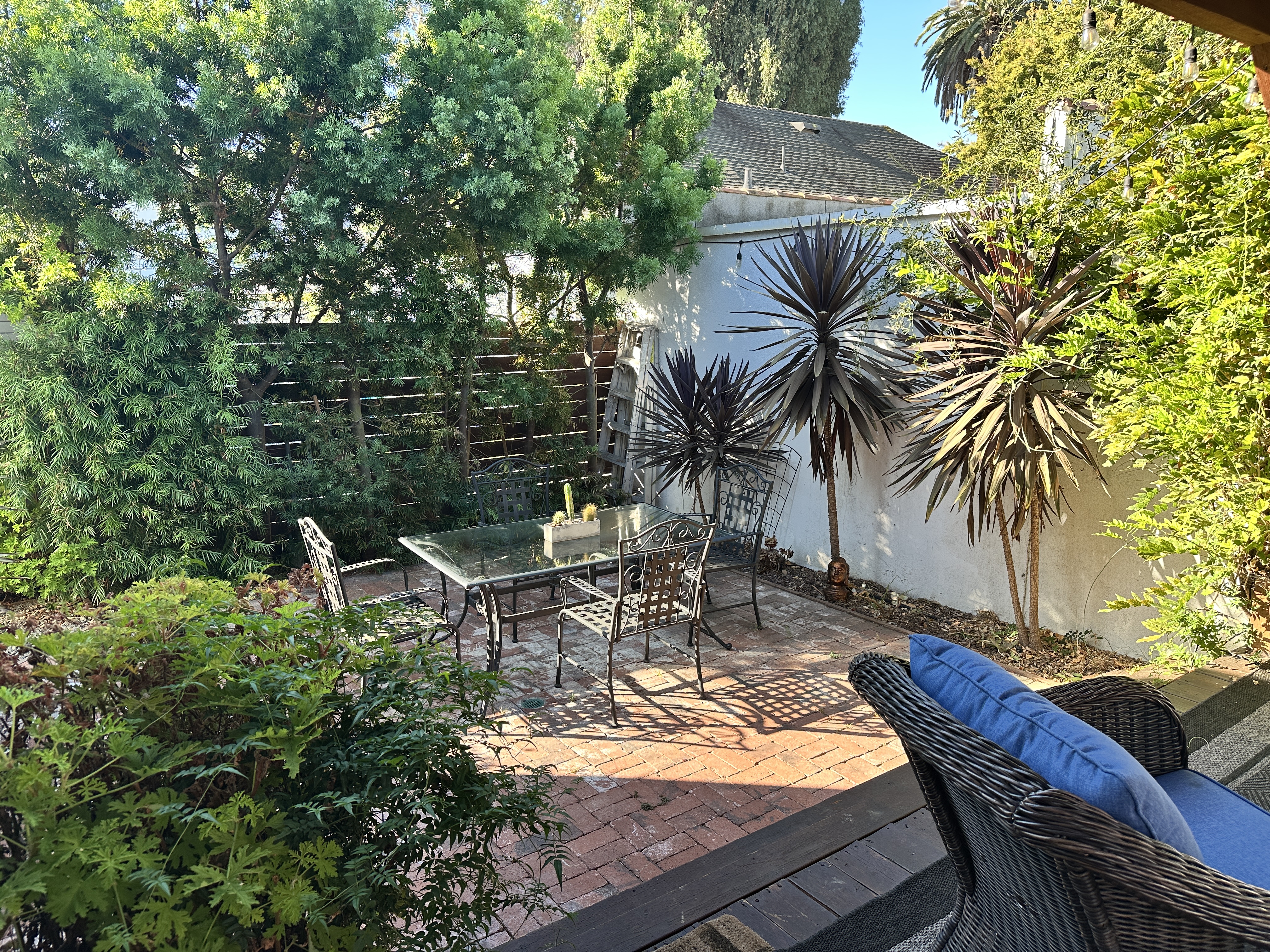 King-size one-bedroom home with covered deck, patio, fruit trees and greenery. Very private. - Photo 2