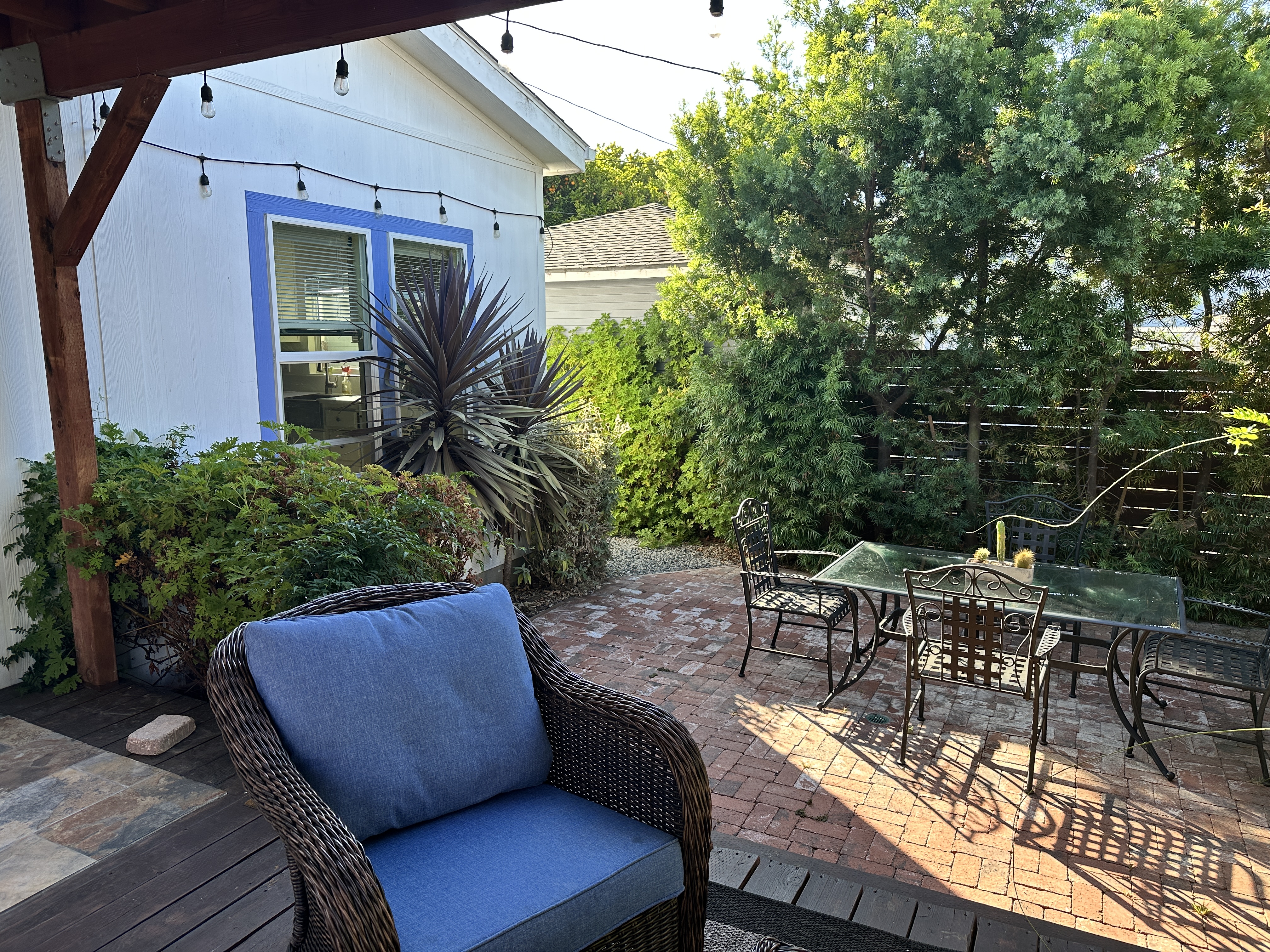King-size one-bedroom home with covered deck, patio, fruit trees and greenery. Very private. - Photo 3