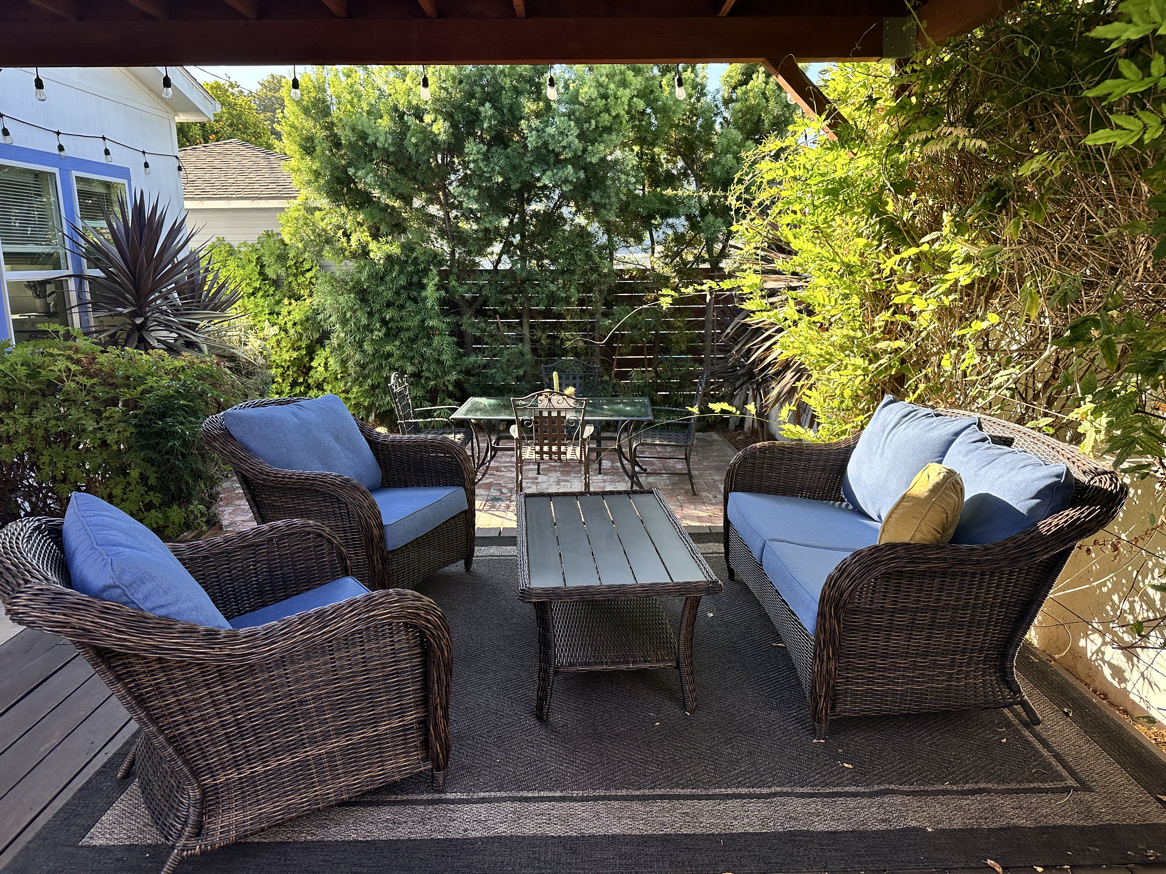 King-size one-bedroom home with covered deck, patio, fruit trees and greenery. Very private. - Photo 1