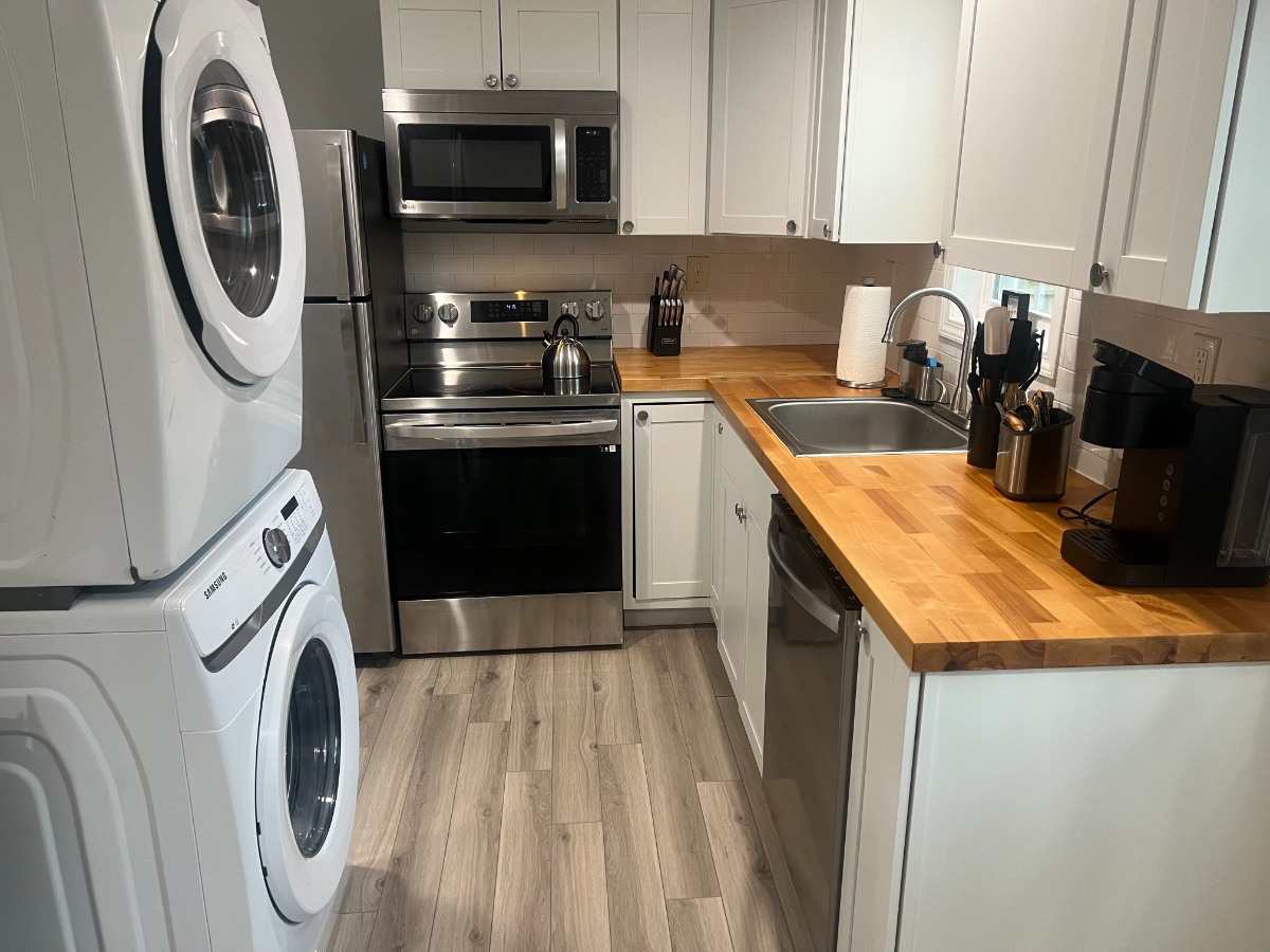 This 2 bed 1.5 Bath unit is your next home away from home. Included parking, laundry, wifi and utili - Photo 5