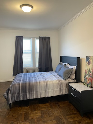 Stylish Two-Bedroom with Luxe Finishes and Cozy Ambience on a Quiet Street - Sleek Bronx Haven - Photo 11