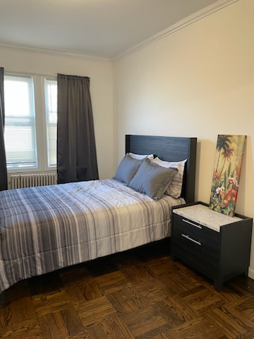 Stylish Two-Bedroom with Luxe Finishes and Cozy Ambience on a Quiet Street - Sleek Bronx Haven - Photo 9