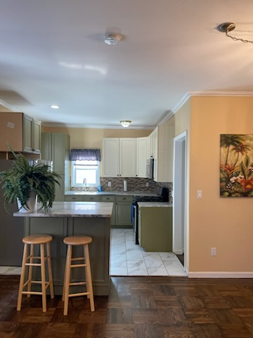 Stylish Two-Bedroom with Luxe Finishes and Cozy Ambience on a Quiet Street - Sleek Bronx Haven - Photo 1