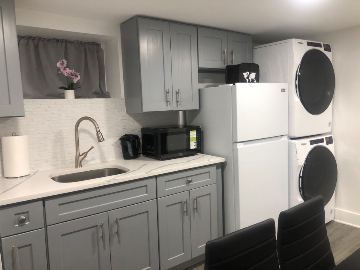Quiet basement apartment with a private entrance. - Photo 1