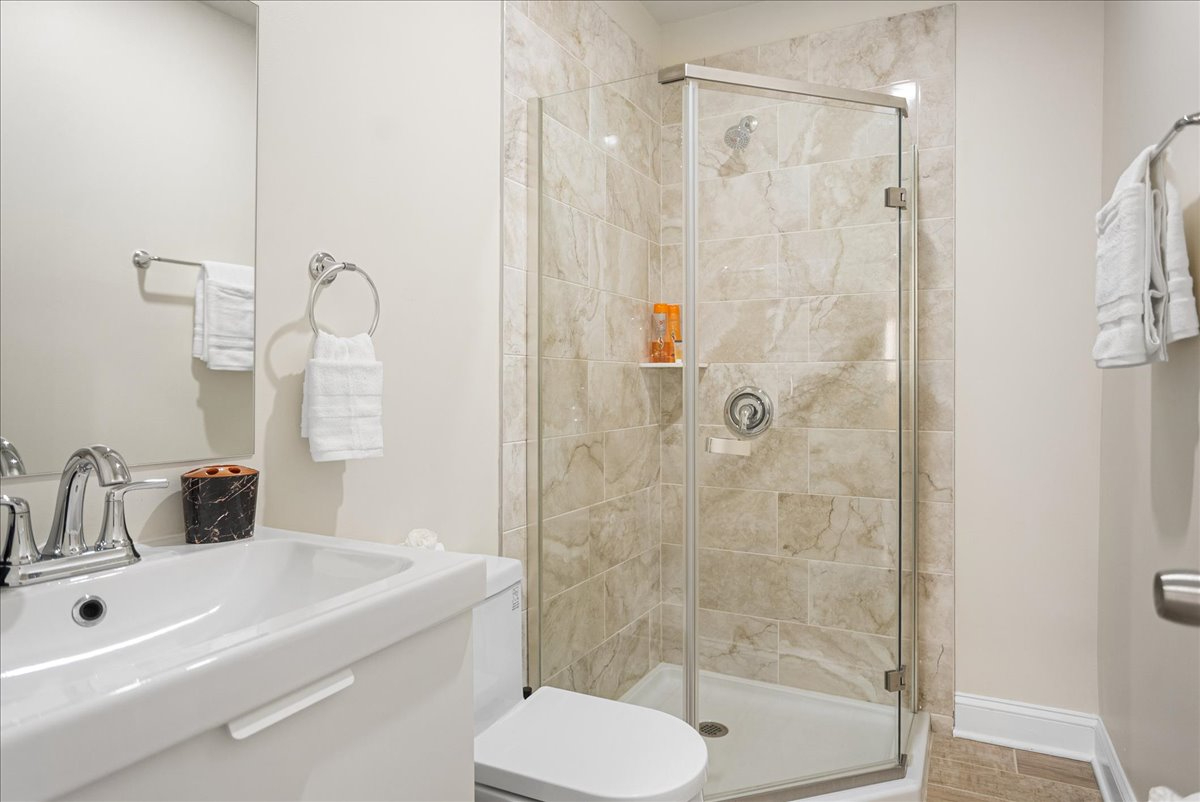 Spacious 4BR Townhome in DC w/ Patio & Parking - Photo 9