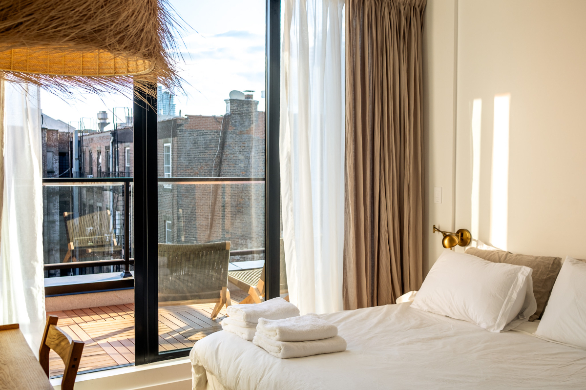 New - ALONK Penthouse - Serene Stay with Manhattan Views - Photo 6