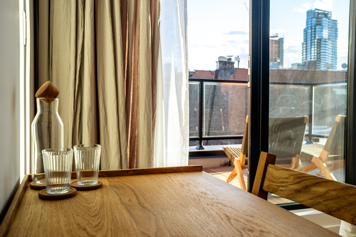 New - ALONK Penthouse - Serene Stay with Manhattan Views - Photo 7