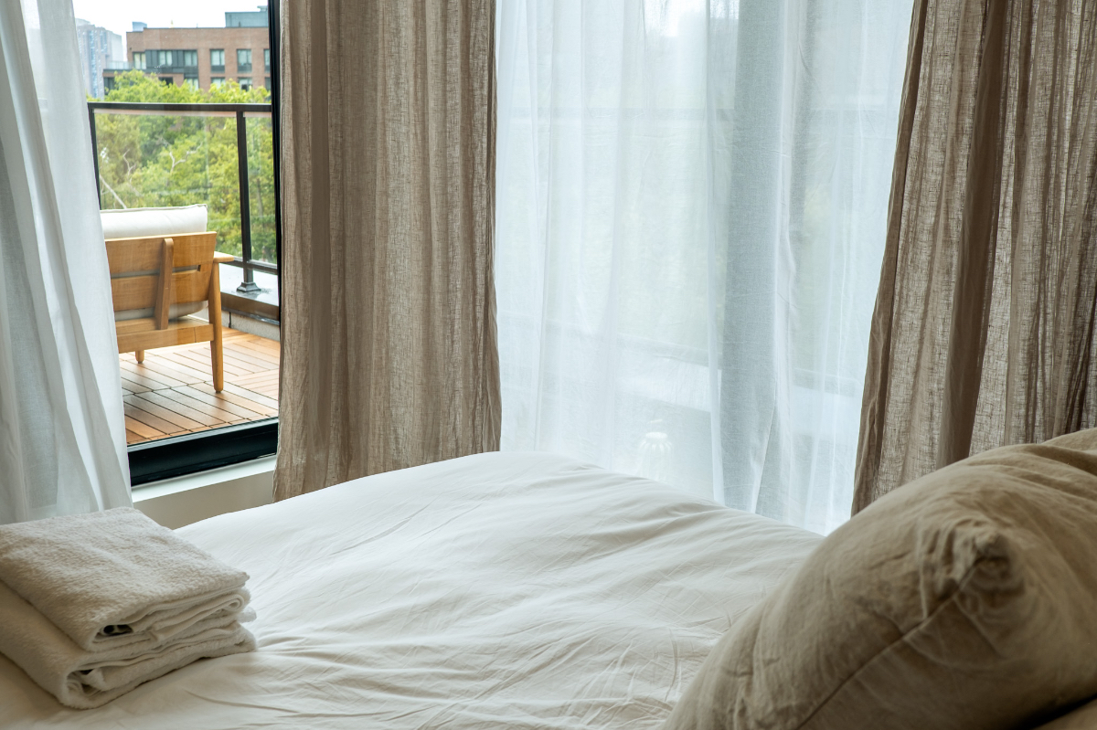 New - ALONK Penthouse - Serene Stay with Manhattan Views - Photo 9