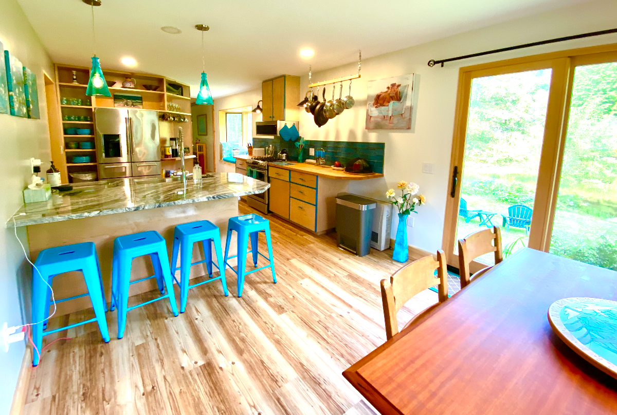 Adorable home on river walk to town - Photo 1