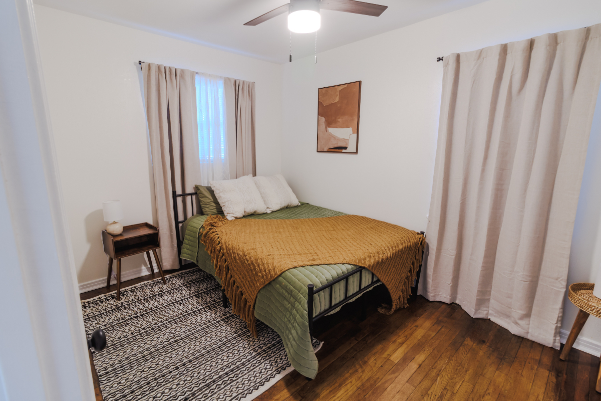 Cozy 3BR House w/Workspace and Spacious Backyard - Photo 11