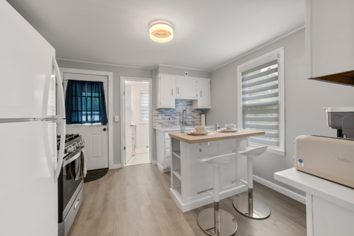 Cozy Private Bedroom with Off Street Parking - Photo 9
