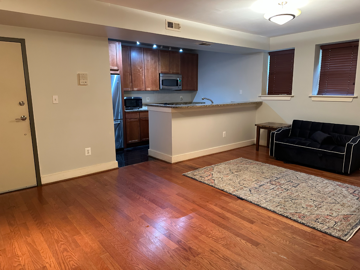 Stylish 1-Bed Condo on Embassy Row with Rooftop Lounge, In-Unit Laundry, and All Utilities Included - Photo 1