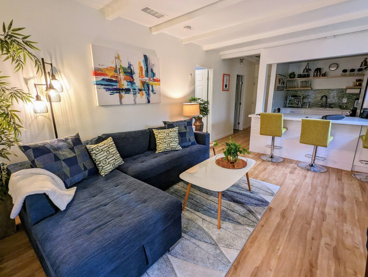 Charming 2BR Apartment w/ Modern Furnishings & Wrap-Around Patio -- Prime Location - Photo 2