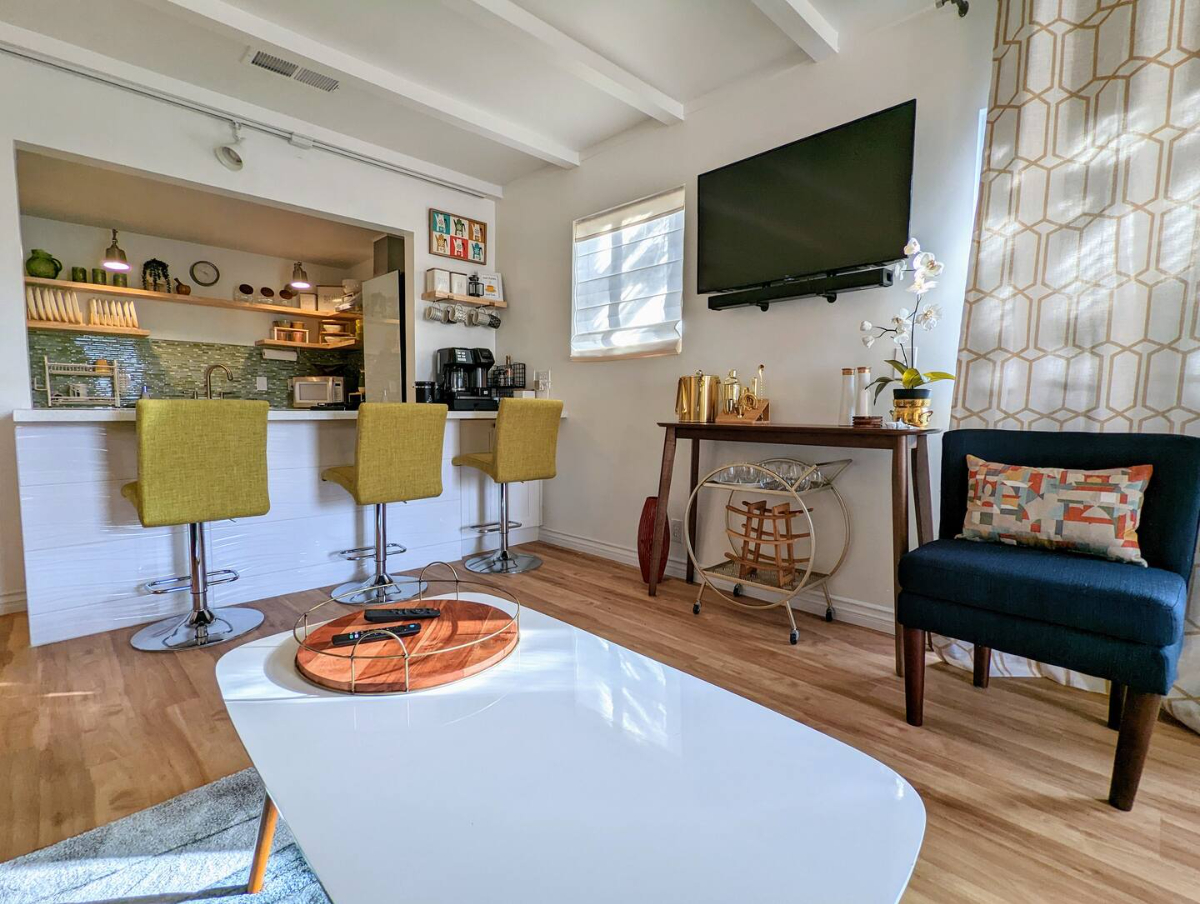 Charming 2BR Apartment w/ Modern Furnishings & Wrap-Around Patio -- Prime Location - Photo 3