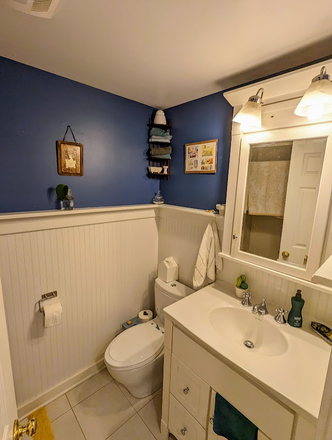 Primary Furnished Bedroom in 2 Bedroom Unit, wood floors, lots of closet space, off-street parking! - Photo 8