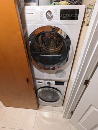 Primary Furnished Bedroom in 2 Bedroom Unit, wood floors, lots of closet space, off-street parking! - Photo 9