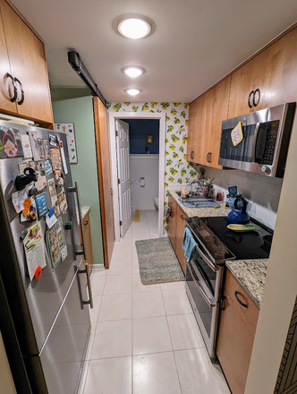 Primary Furnished Bedroom in 2 Bedroom Unit, wood floors, lots of closet space, off-street parking! - Photo 10